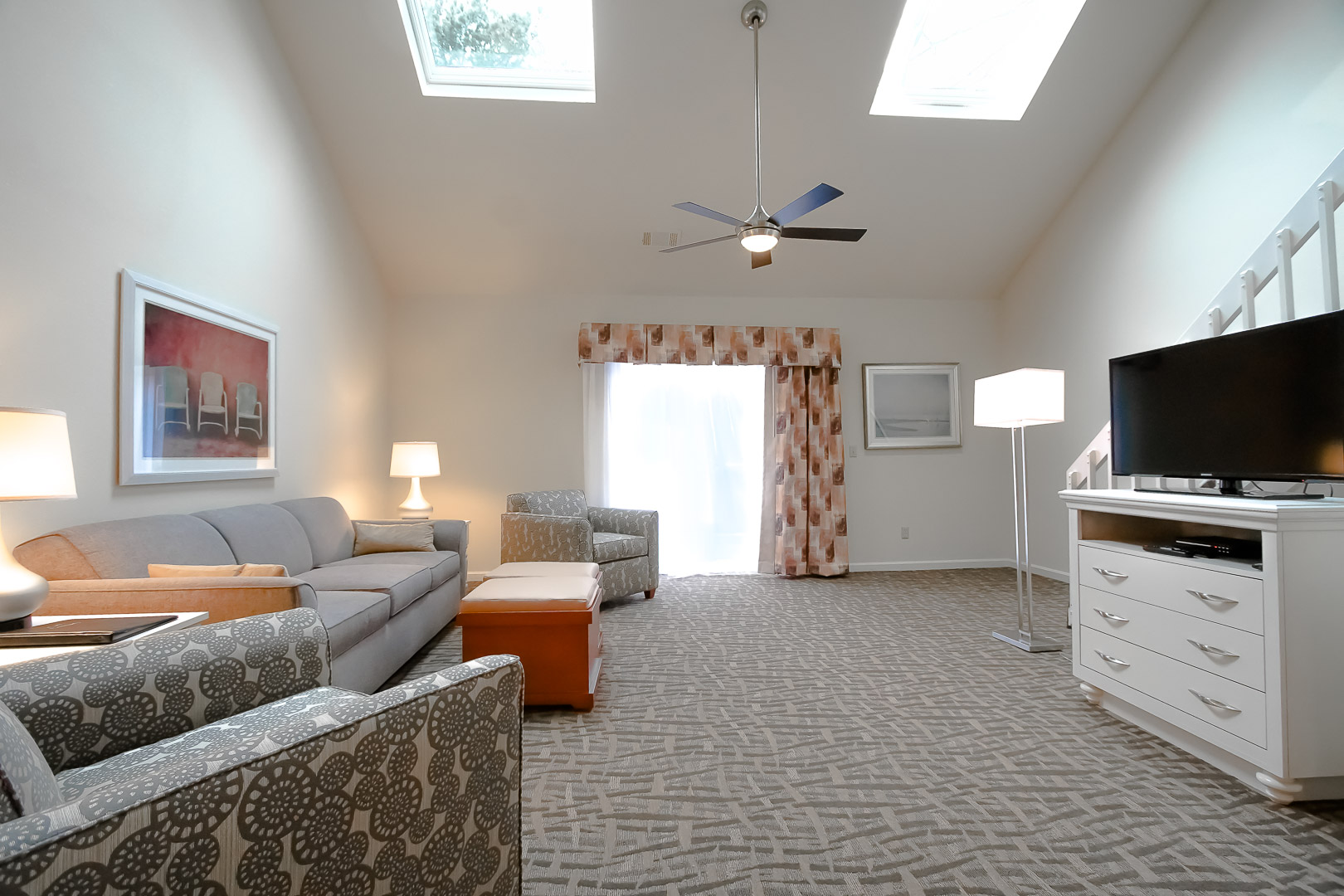 A spacious living room area at VRI's Sea Mist Resort in Massachusetts.
